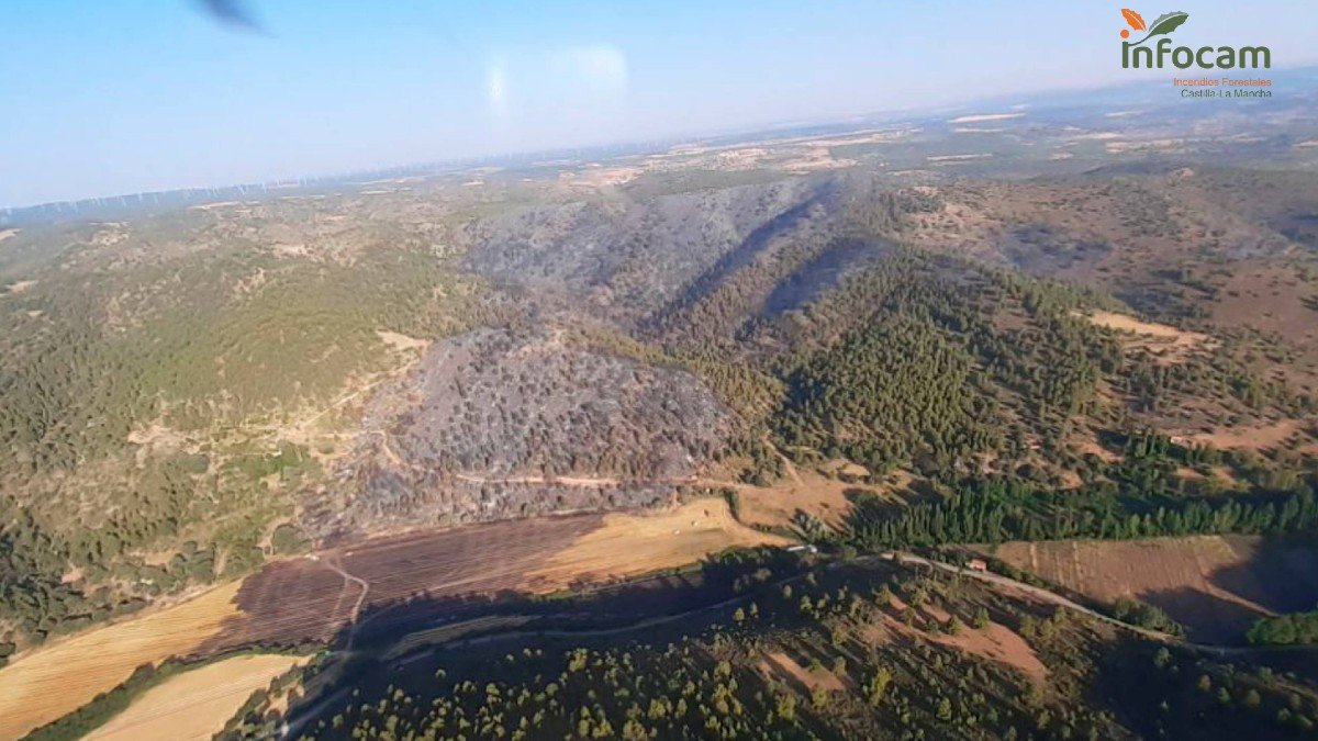 El fuego declarado en el paraje de La Rinconada ha afectado a una zona de arbolado. - PLAN INFOCAM